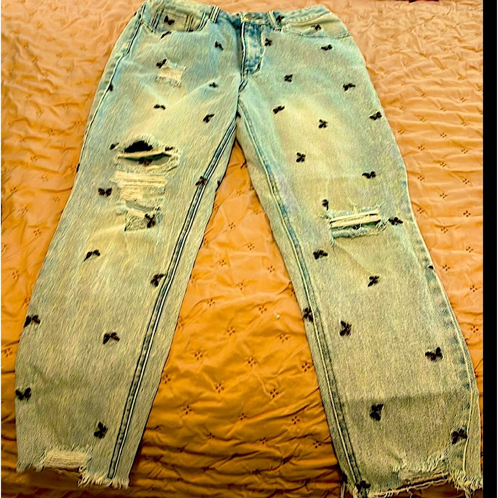 Fun playful jeans with butterfly details.
